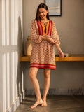 Patterned dress with sleeves