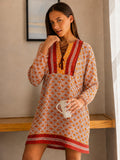 Patterned dress with sleeves